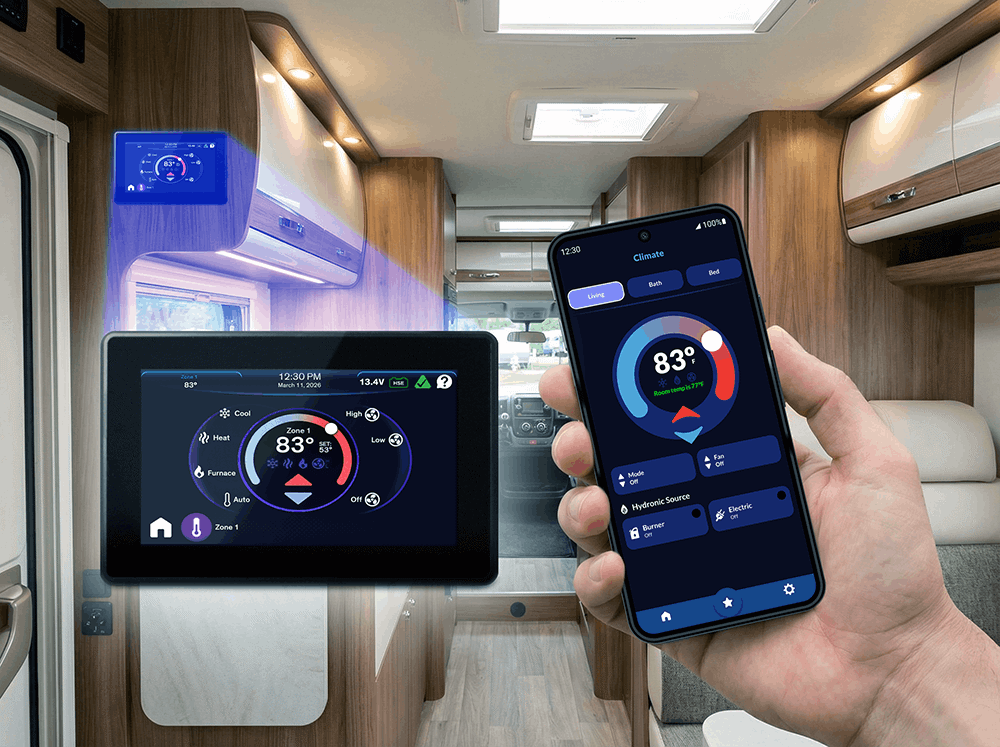 Interior of an RV showcasing a Firefly touch screen next to a hand holding a phone with the RV+ app controlling the climate screen